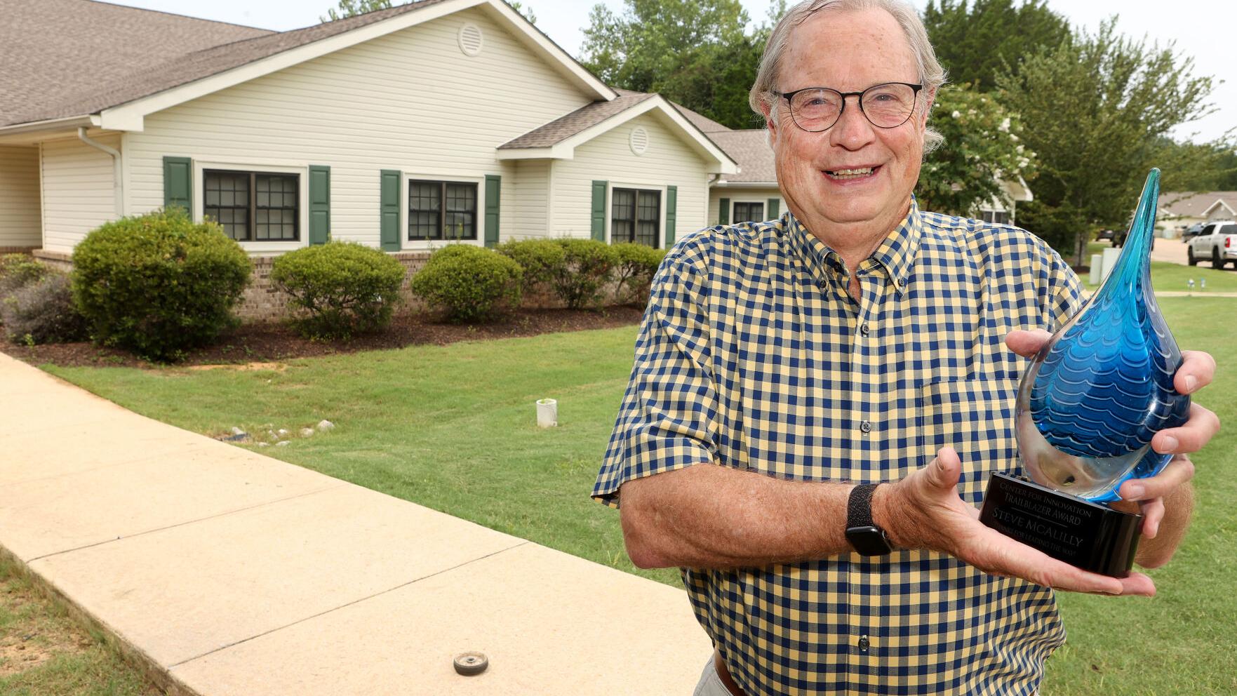Steve McAlilly receives award for 20 years of work with Green House Project